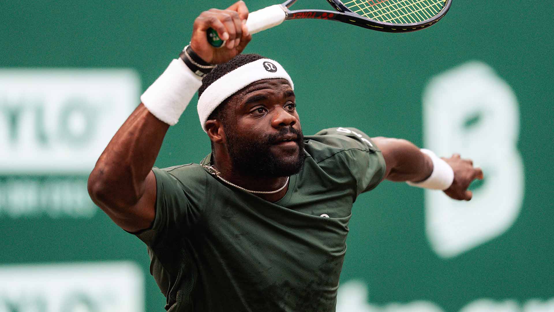 Frances Tiafoe defeats Felix Auger-Aliassime in three sets Friday in Halle.